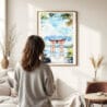 03 - Framed Hakone Gate Watercolor Wall Art - In Living Room with Woman Looking at it - Portrait