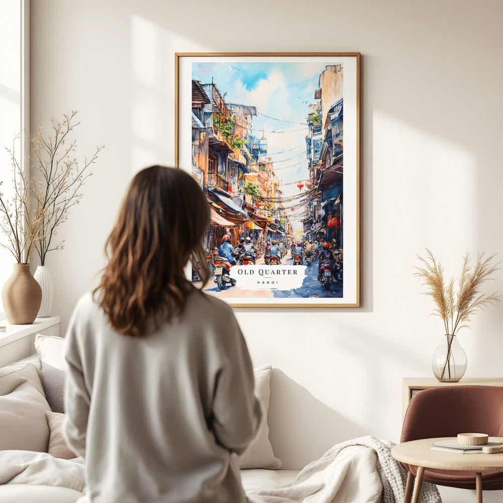 03 - Framed Hanoi Old Quarter Watercolor Wall Art - In Living Room with Woman Looking at it - Portrait.jpg 03 - Framed Hanoi Old Quarter Watercolor Wall Art - In Living Room with Woman Looking at it - Portrait.jpg