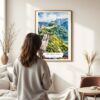 03 - Framed The Great Wall of China Watercolor Wall Art - In Living Room with Woman Looking at it - Portrait.jpg