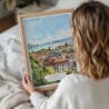 05 - Woman Holding Framed Geneva Switzerland Watercolor Wall Art - Portrait.jpg