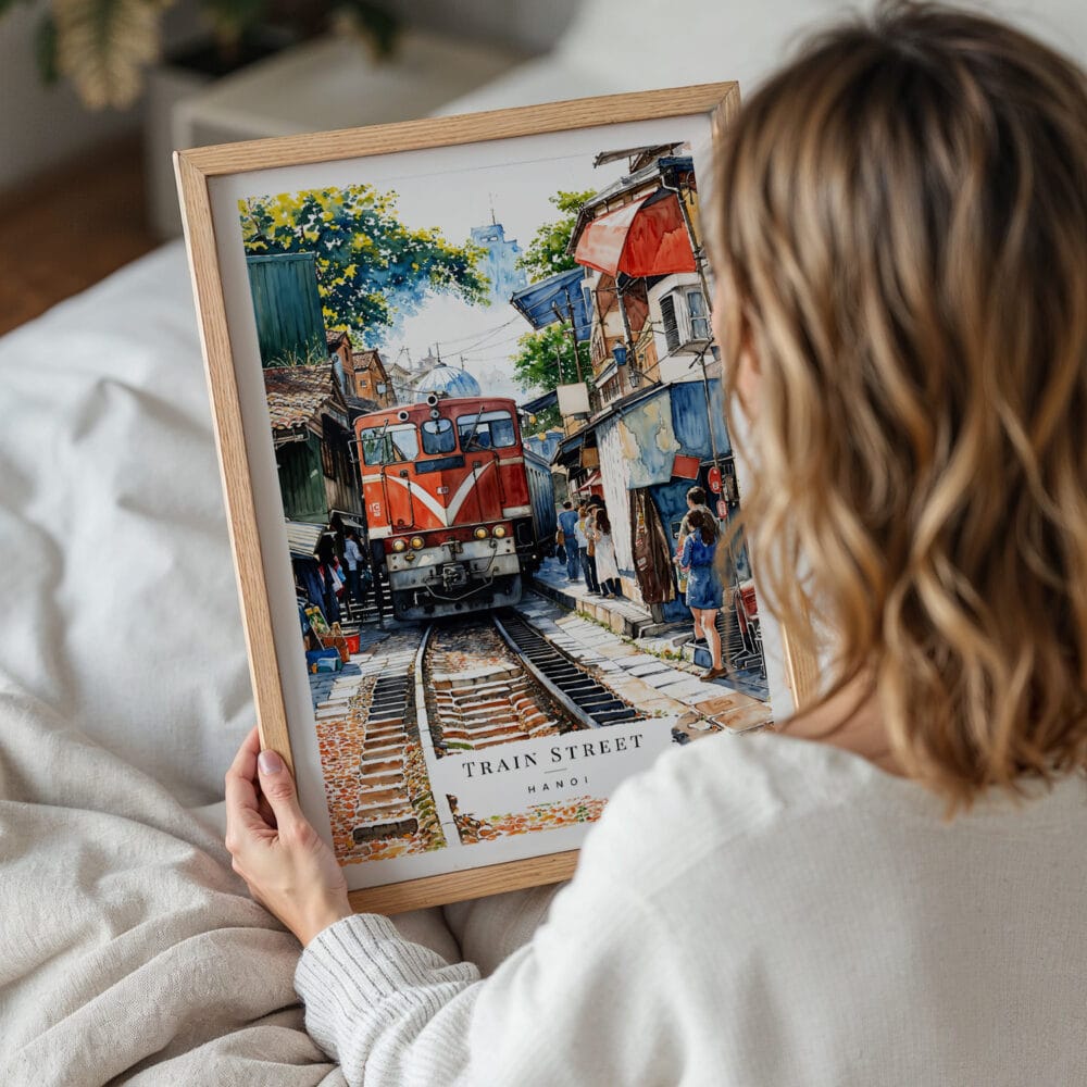 05 - Woman Holding Framed Hanoi Train Street Vietnam Watercolor Wall Art - Portrait.jpg 05 - Woman Holding Framed Hanoi Train Street Vietnam Watercolor Wall Art - Portrait.jpg