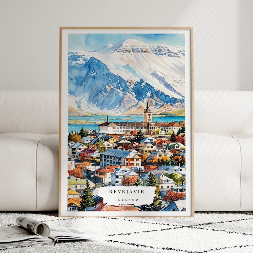 01 - Framed Reykjavik Watercolor Wall Art leaning against couch - Portrait.jpg 01 - Framed Reykjavik Watercolor Wall Art leaning against couch - Portrait.jpg