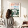 03 - Framed Athens Georgia Watercolor Wall Art - In Living Room with Woman Looking at it - Portrait.jpg