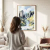 03 - Framed Fjadrargljufur Canyon Watercolor Wall Art - In Living Room with Woman Looking at it - Portrait.jpg
