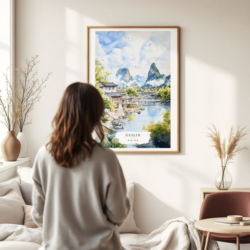 03 - Framed Guilin China Watercolor Wall Art - In Living Room with Woman Looking at it - Portrait.jpg 03 - Framed Guilin China Watercolor Wall Art - In Living Room with Woman Looking at it - Portrait.jpg