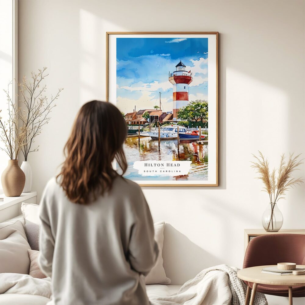 03 - Framed Hilton Head South Carolina Watercolor Wall Art - In Living Room with Woman Looking at it - Portrait.jpg 03 - Framed Hilton Head South Carolina Watercolor Wall Art - In Living Room with Woman Looking at it - Portrait.jpg