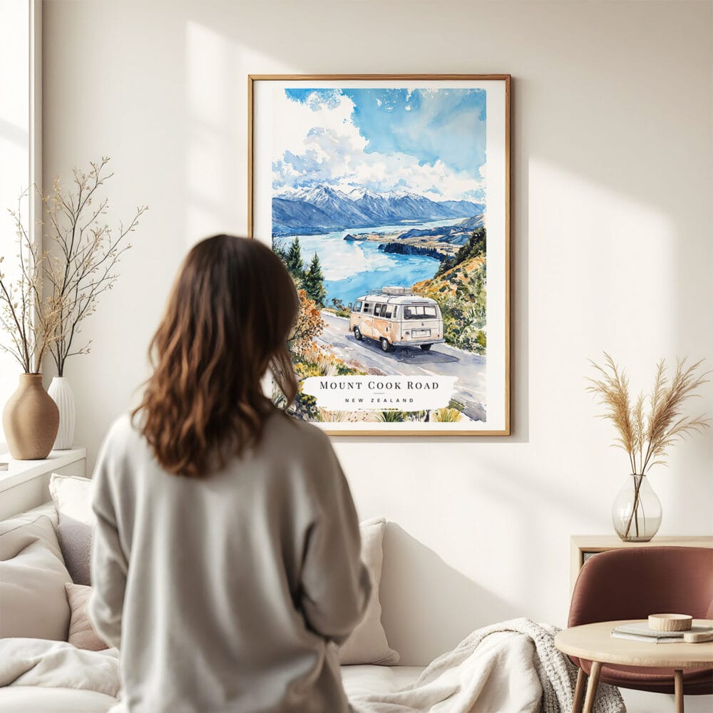 03 - Framed Mount Cook Road NZ Watercolor Wall Art - In Living Room with Woman Looking at it - Portrait.jpg 03 - Framed Mount Cook Road NZ Watercolor Wall Art - In Living Room with Woman Looking at it - Portrait.jpg