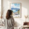 03 - Framed Mount Cook Road NZ Watercolor Wall Art - In Living Room with Woman Looking at it - Portrait.jpg