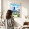 03 - Framed Perth Australia Watercolor Wall Art - In Living Room with Woman Looking at it - Portrait.jpg