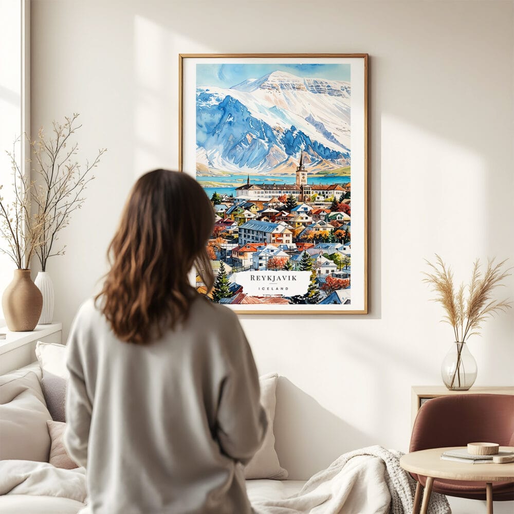 03 - Framed Reykjavik Watercolor Wall Art - In Living Room with Woman Looking at it - Portrait.jpg 03 - Framed Reykjavik Watercolor Wall Art - In Living Room with Woman Looking at it - Portrait.jpg
