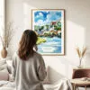 03 - Framed Salzburg Austria Watercolor Wall Art - In Living Room with Woman Looking at it - Portrait.jpg
