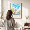 03 - Framed San Salvador Watercolor Wall Art - In Living Room with Woman Looking at it - Portrait.jpg