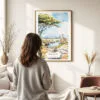 03 - Framed Serengeti Africa Watercolor Wall Art - In Living Room with Woman Looking at it - Portrait.jpg