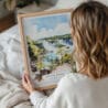 05 - Woman Holding Framed Iguazu Falls Watercolor Wall Art - Portrait.jpg