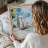 05 - Woman Holding Framed Lisboa Torre de Belém Watercolor Wall Art - Portrait.jpg