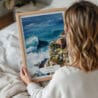 05 - Woman Holding Framed Nazare Portugal Watercolor Wall Art - Portrait.jpg