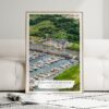 01 - Framed Guilford Connecticut Yacht Club Watercolor Wall Art leaning against couch - Portrait.jpg