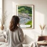 03 - Framed Guilford Connecticut Yacht Club Watercolor Wall Art - In Living Room with Woman Looking at it - Portrait.jpg