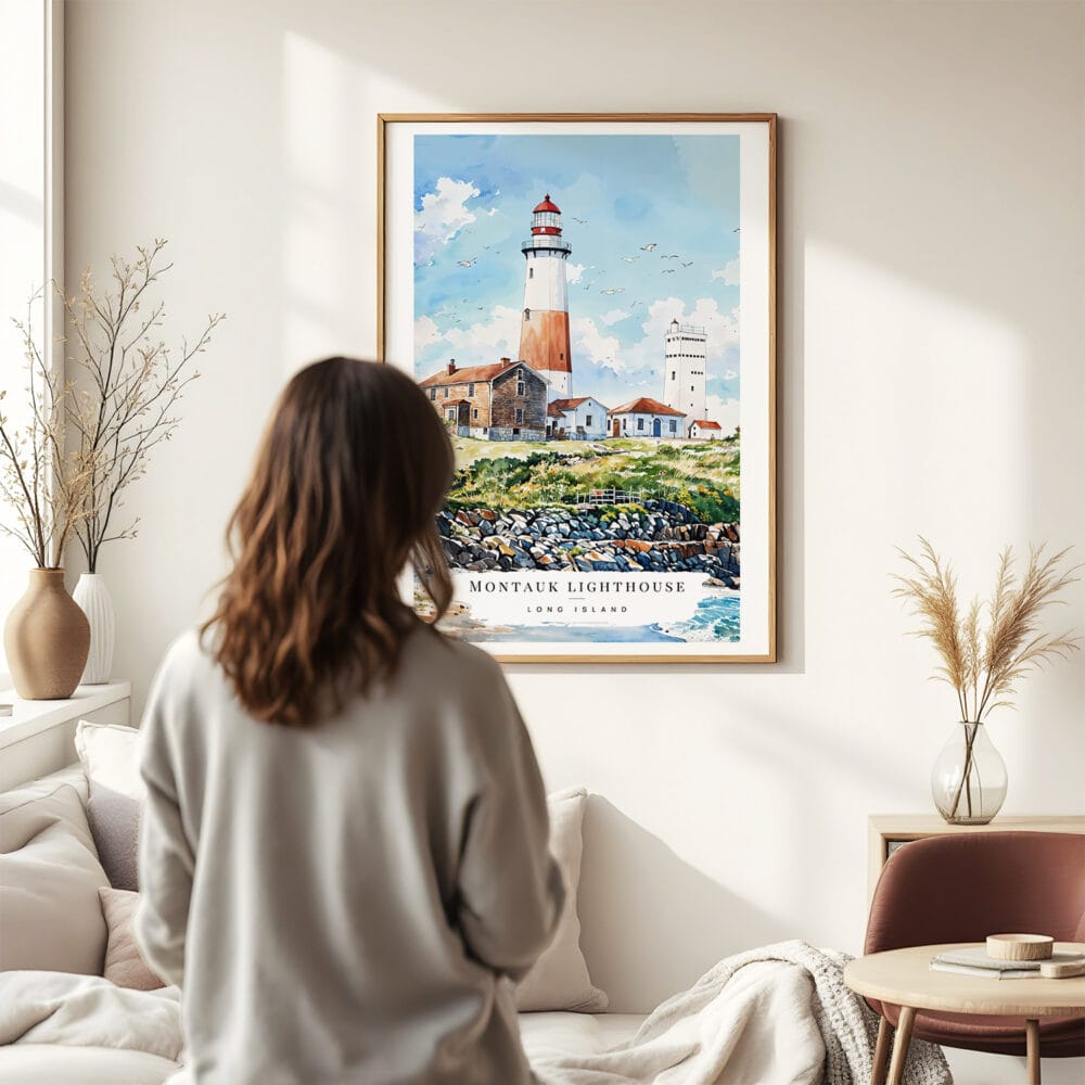 03 - Framed Montauk lighthouse Watercolor Wall Art - In Living Room with Woman Looking at it - Portrait.jpg 03 - Framed Montauk lighthouse Watercolor Wall Art - In Living Room with Woman Looking at it - Portrait.jpg