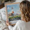 05 - Woman Holding Framed Montauk lighthouse Watercolor Wall Art - Portrait.jpg