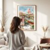 03 - Framed Penang Malaysia Watercolor Wall Art - In Living Room with Woman Looking at it - Portrait.jpg