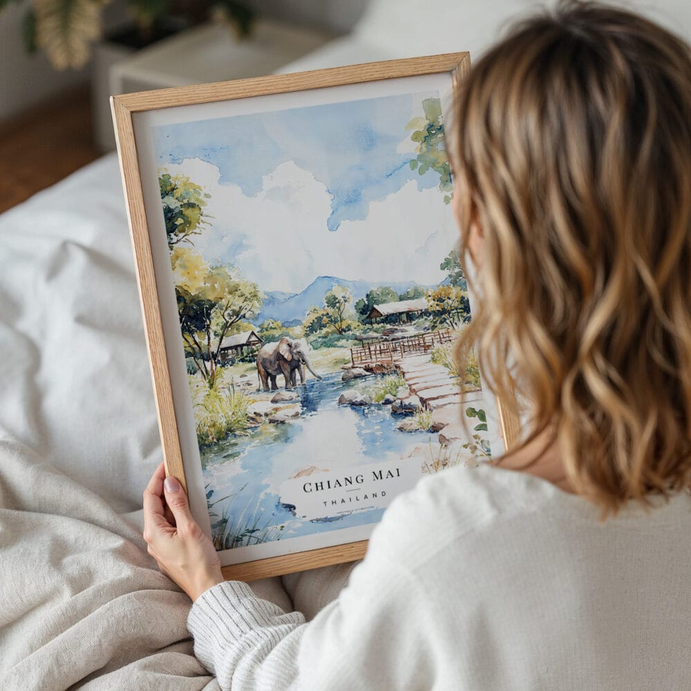 05 - Woman Holding Framed Chiang Mai Elephant Watercolor Wall Art - Portrait.jpg 05 - Woman Holding Framed Chiang Mai Elephant Watercolor Wall Art - Portrait.jpg