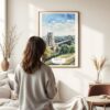 03 - Framed Clifton Bridge Bristol Watercolor Wall Art - In Living Room with Woman Looking at it - Portrait.jpg