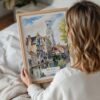 05 - Woman Holding Framed Bruges Belgium Watercolor Wall Art - Portrait.jpg