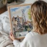 05 - Woman Holding Framed Bruges Belgium Watercolor Wall Art - Portrait.jpg