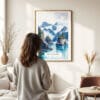 03 - Framed Kenai Fjords National Park Watercolor Wall Art - In Living Room with Woman Looking at it - Portrait.jpg