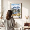 03 - Framed Kings Canyon National Park Watercolor Wall Art - In Living Room with Woman Looking at it - Portrait.jpg