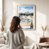 03 - Framed Lassen Volcanic National Park Watercolor Wall Art - In Living Room with Woman Looking at it - Portrait.jpg