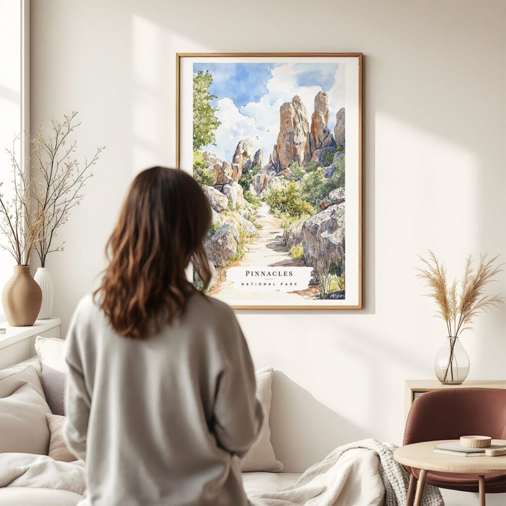 03 - Framed Pinnacles National Park California Watercolor Wall Art - In Living Room with Woman Looking at it - Portrait.jpg 03 - Framed Pinnacles National Park California Watercolor Wall Art - In Living Room with Woman Looking at it - Portrait.jpg