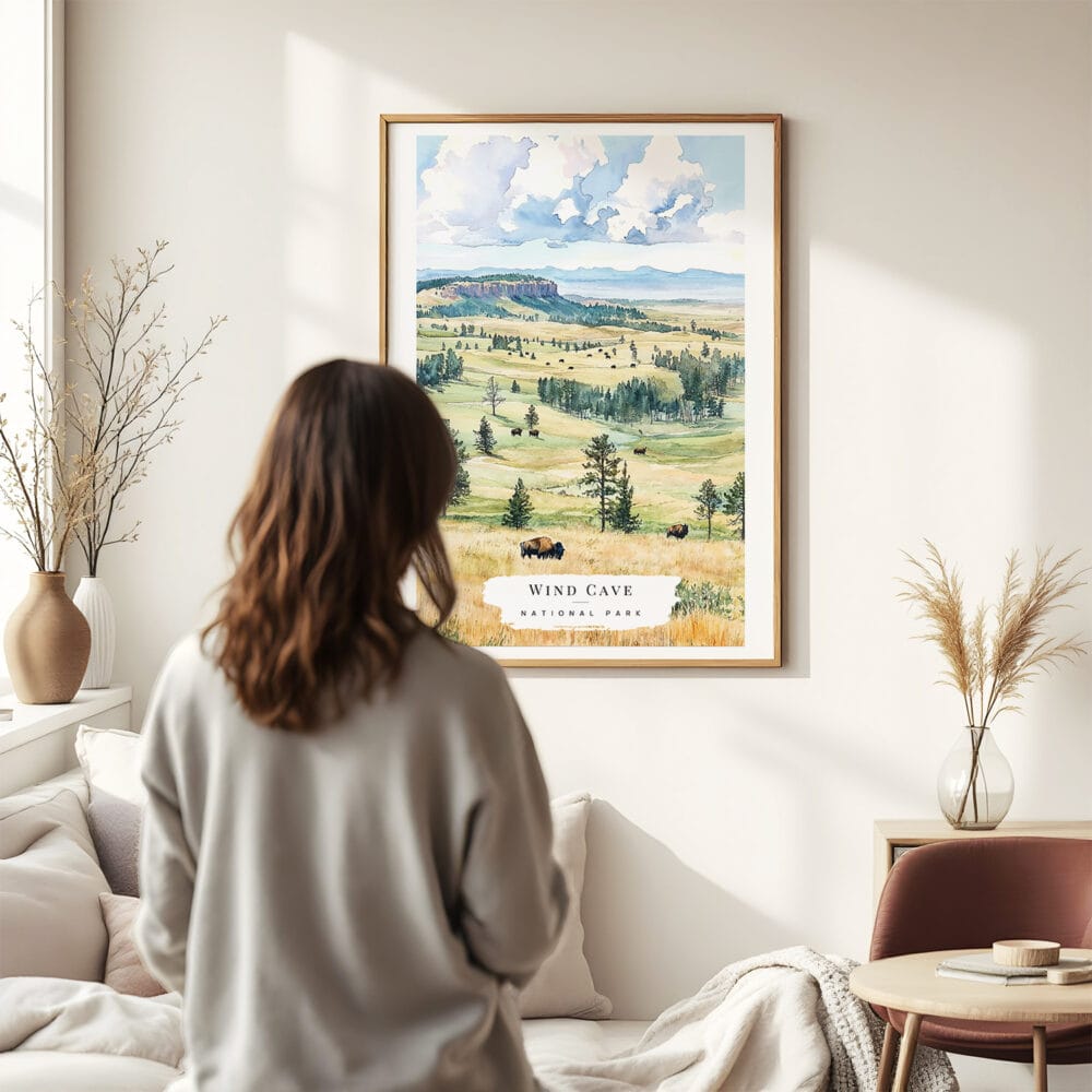 03 - Framed Wind Cave National Park Watercolor Wall Art - In Living Room with Woman Looking at it - Portrait.jpg 03 - Framed Wind Cave National Park Watercolor Wall Art - In Living Room with Woman Looking at it - Portrait.jpg
