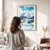 03 - Framed Wrangell-St. Elias National Park Watercolor Wall Art - In Living Room with Woman Looking at it - Portrait.jpg