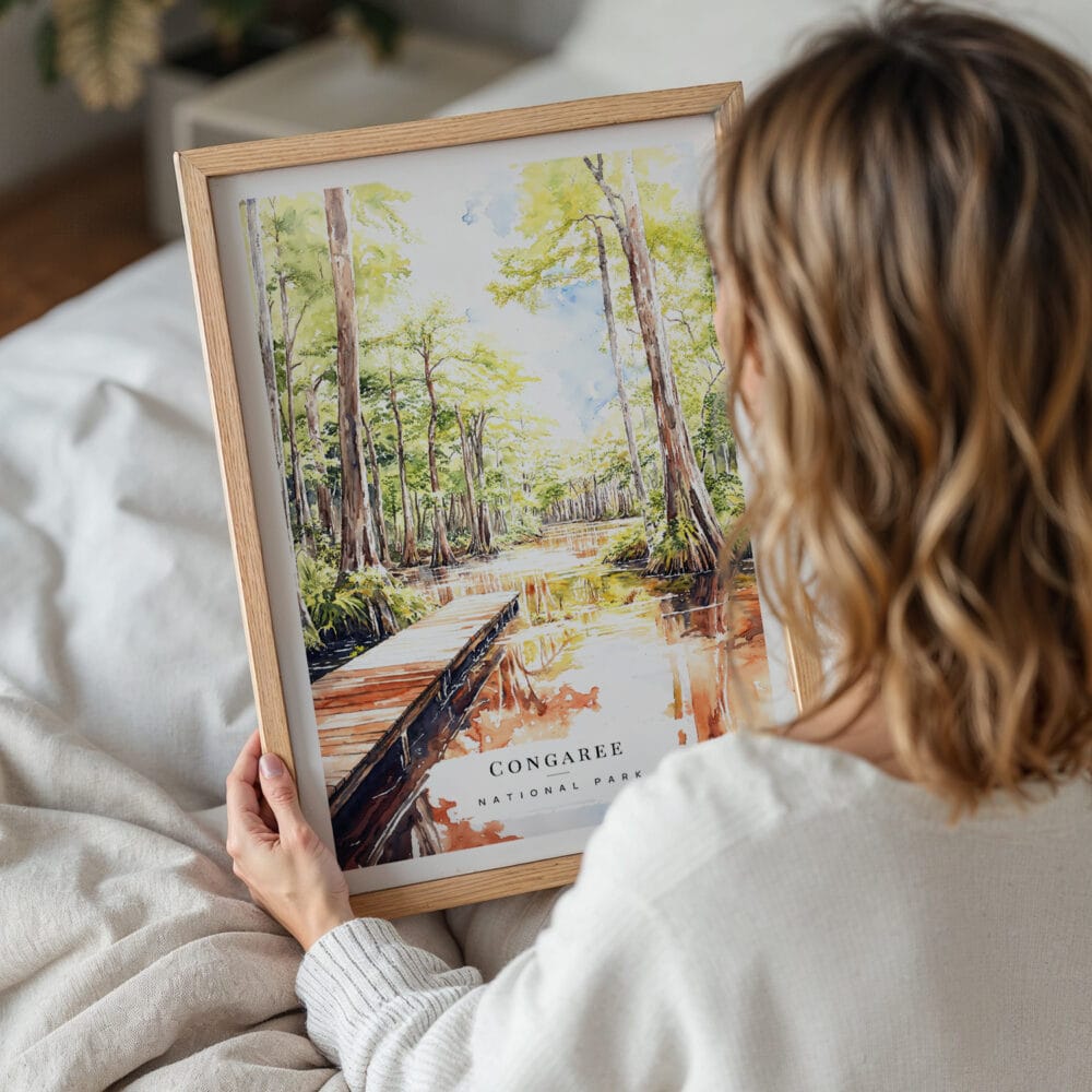 05 - Woman Holding Framed Congaree National Park Watercolor Wall Art - Portrait.jpg 05 - Woman Holding Framed Congaree National Park Watercolor Wall Art - Portrait.jpg