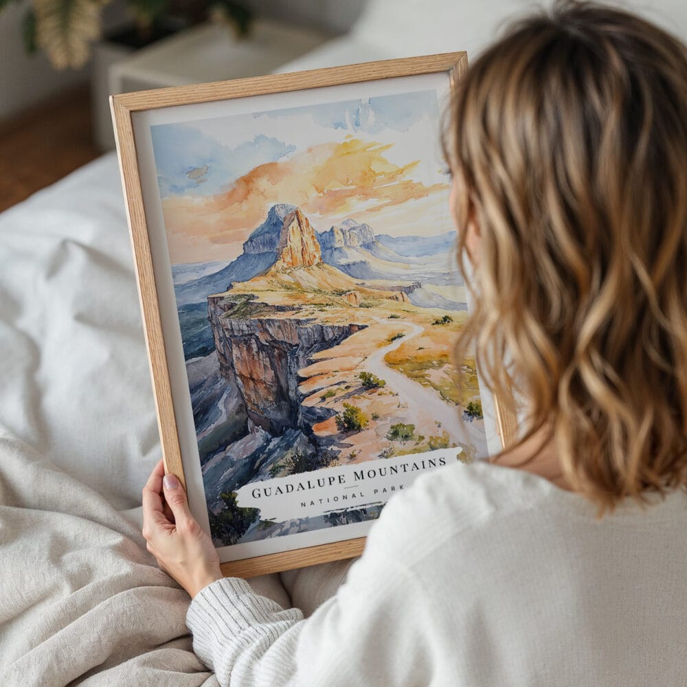 05 - Woman Holding Framed Guadalupe Mountains National Park Watercolor Wall Art - Portrait.jpg 05 - Woman Holding Framed Guadalupe Mountains National Park Watercolor Wall Art - Portrait.jpg