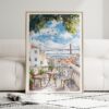 01 - Framed Morning Coffee in Lisbon Watercolor Art Print leaning against couch - Vertical.jpg
