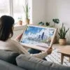 02 - A Woman Holding A Framed Chicago Skyline Watercolor Art - Horizontal Art Print.jpg
