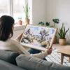 02 - A Woman Holding A Framed Joshua Tree National Park Watercolor - Horizontal Art Print.jpg