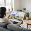 02 - A Woman Holding A Framed Katmai National Park Watercolor - Horizontal Art Print.jpg