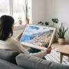 02 - A Woman Holding A Framed Positano Italy Watercolor Art - Horizontal Art Print.jpg