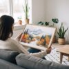 02 - A Woman Holding A Framed White Mountains National Park Watercolor - Horizontal Art Print.jpg