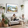 02 - Framed Adirondack Mountains Watercolor - Horizontal Canvas Print - Boho Living Room with Woman reading.jpg