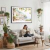 02 - Framed Amalfi Coast with Lemon Trees Watercolor Art - Horizontal Canvas Print - Boho Living Room with Woman reading.jpg