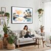 02 - Framed Biscayne National Park Watercolor - Horizontal Canvas Print - Boho Living Room with Woman reading.jpg