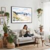02 - Framed Cannon Beach Watercolor - Horizontal Canvas Print - Boho Living Room with Woman reading.jpg