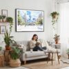 02 - Framed Chicago Cloud Gate Watercolor Art - Horizontal Canvas Print - Boho Living Room with Woman reading.jpg