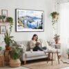 02 - Framed Crater Lake National Park Watercolor - Horizontal Canvas Print - Boho Living Room with Woman reading.jpg