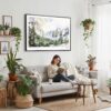 02 - Framed El Capitan Watercolor - Horizontal Canvas Print - Boho Living Room with Woman reading.jpg